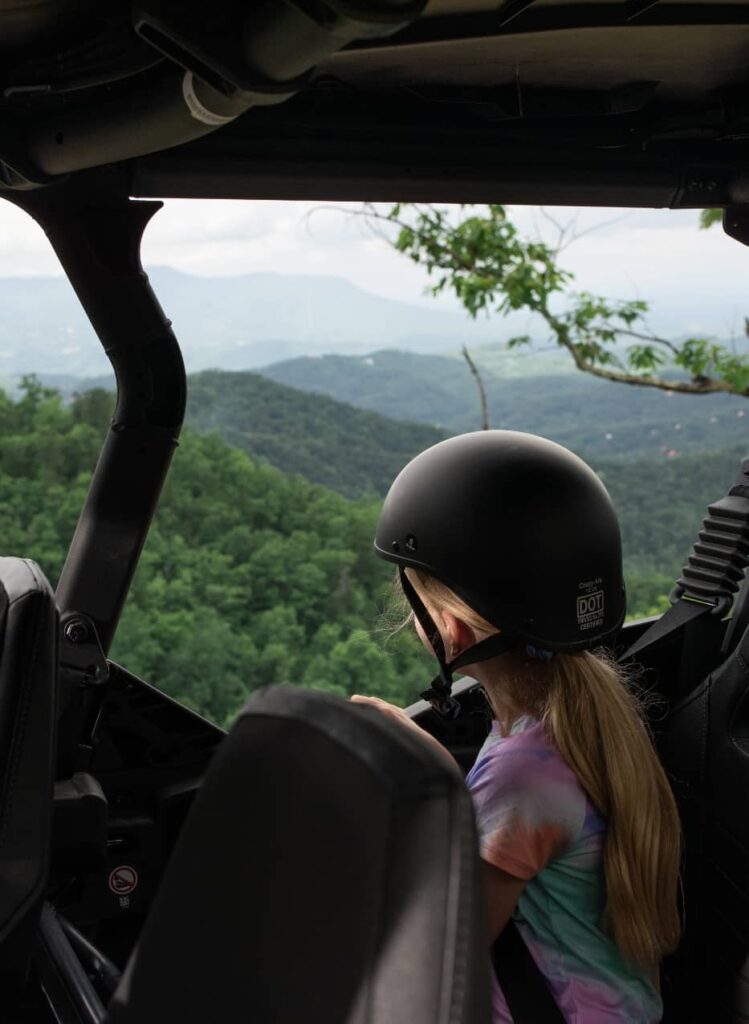 UTVs stopping at a scenic wooded section of Smoky Mountain trail