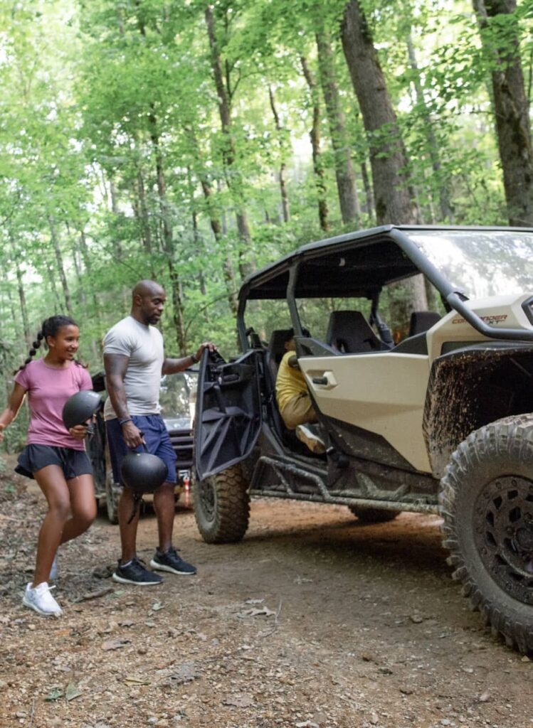 Family stopping on a UTV tour to enjoy the view